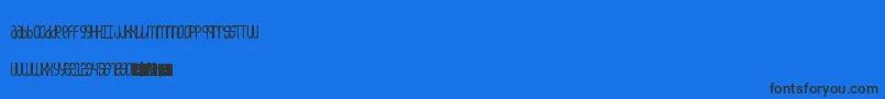 Czcionka 5champagneUnicase – czarne czcionki na niebieskim tle