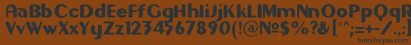 フォントGilgons – 黒い文字が茶色の背景にあります