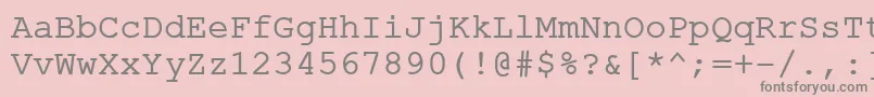 ErKurierKoi8R-fontti – harmaat kirjasimet vaaleanpunaisella taustalla