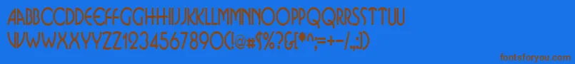 BusinkosqueezedRegular-fontti – ruskeat fontit sinisellä taustalla