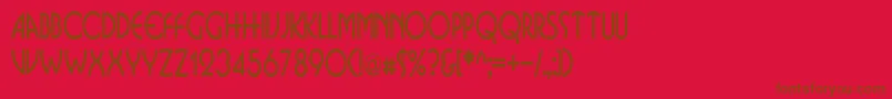 BusinkosqueezedRegular-Schriftart – Braune Schriften auf rotem Hintergrund