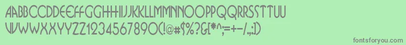 フォントBusinkosqueezedRegular – 緑の背景に灰色の文字