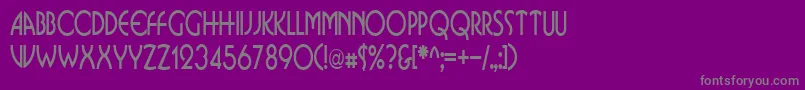 BusinkosqueezedRegular-fontti – harmaat kirjasimet violetilla taustalla