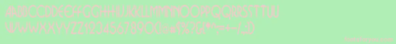 BusinkosqueezedRegular Font – Pink Fonts on Green Background
