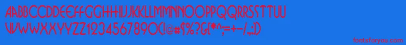 BusinkosqueezedRegular Font – Red Fonts on Blue Background