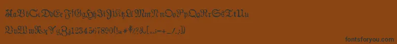 Auldmagick-Schriftart – Schwarze Schriften auf braunem Hintergrund