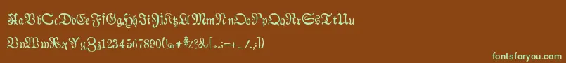 フォントAuldmagick – 緑色の文字が茶色の背景にあります。