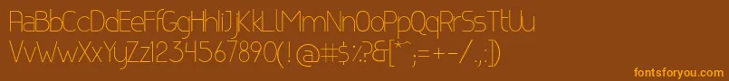 CanelaLight Font – Orange Fonts on Brown Background