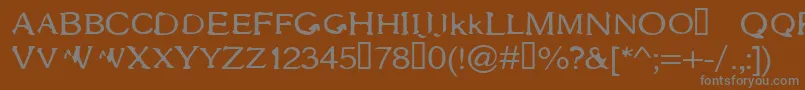 フォントGothac – 茶色の背景に灰色の文字