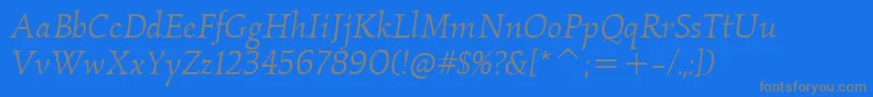 Czcionka KallositcTtBookitalic – szare czcionki na niebieskim tle