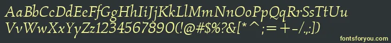 フォントKallositcTtBookitalic – 黒い背景に黄色の文字