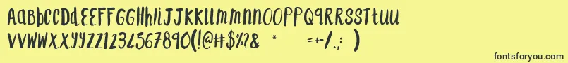 F...SaintTropez Font – Black Fonts on Yellow Background