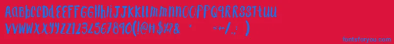 Czcionka F...SaintTropez – niebieskie czcionki na czerwonym tle