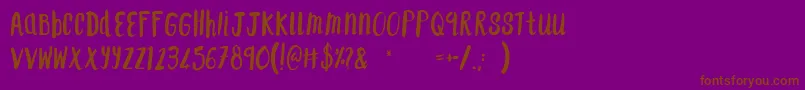 Шрифт F...SaintTropez – коричневые шрифты на фиолетовом фоне