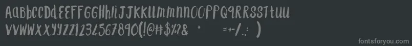 F...SaintTropez Font – Gray Fonts on Black Background