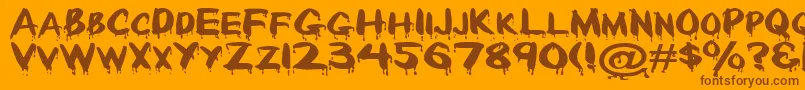 Paintdrp-Schriftart – Braune Schriften auf orangefarbenem Hintergrund