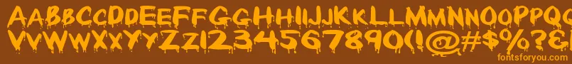Paintdrp Font – Orange Fonts on Brown Background