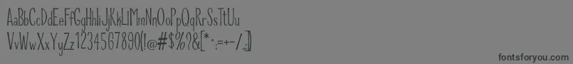 RiddleUpright Font – Black Fonts on Gray Background
