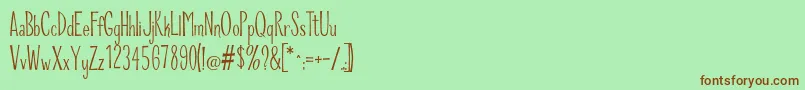 RiddleUpright Font – Brown Fonts on Green Background
