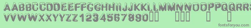 CfsnowballRegular Font – Gray Fonts on Green Background