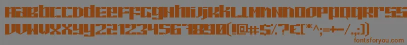 フォントPilotonG – 茶色の文字が灰色の背景にあります。