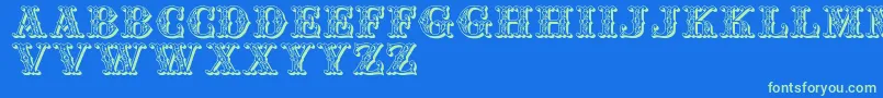 Jfspringfair Font – Green Fonts on Blue Background