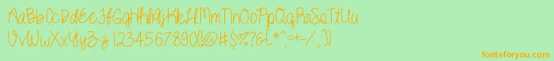 Kenzie Font – Orange Fonts on Green Background
