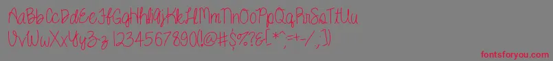 Kenzie Font – Red Fonts on Gray Background