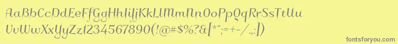 フォントCharakterny – 黄色の背景に灰色の文字