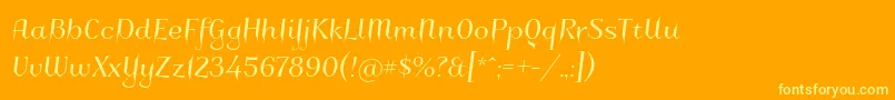 Charakterny Font – Yellow Fonts on Orange Background