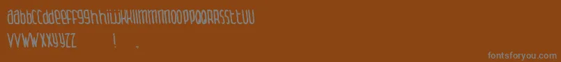 ThingamabobNormal-Schriftart – Graue Schriften auf braunem Hintergrund