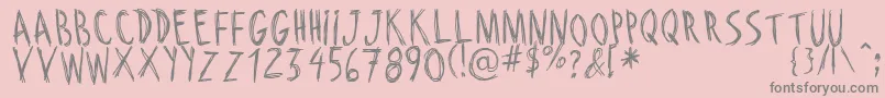 RiscadaDoodle-fontti – harmaat kirjasimet vaaleanpunaisella taustalla