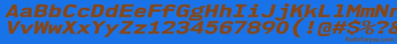Nk57MonospaceExEbIt Font – Brown Fonts on Blue Background