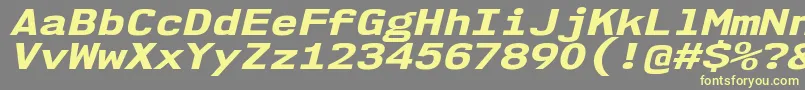 Nk57MonospaceExEbIt Font – Yellow Fonts on Gray Background