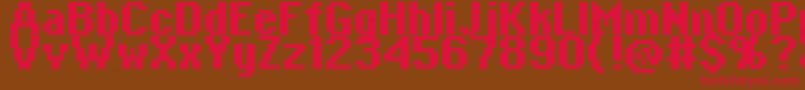 フォントCopy0865 – 赤い文字が茶色の背景にあります。
