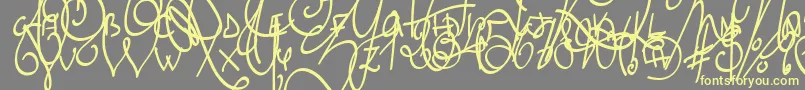 LyricDragonBold Font – Yellow Fonts on Gray Background