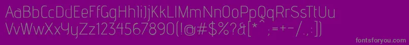 AdventLt1-Schriftart – Graue Schriften auf violettem Hintergrund