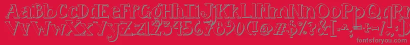 フォントJandacurlygirlpop – 赤い背景に灰色の文字
