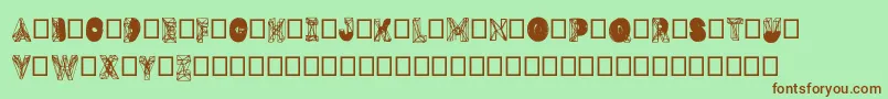 フォントDmesh – 緑の背景に茶色のフォント