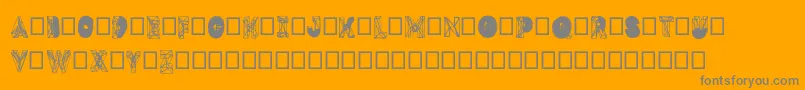 Czcionka Dmesh – szare czcionki na pomarańczowym tle