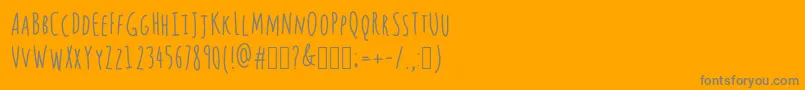 フォントQuestions – オレンジの背景に灰色の文字