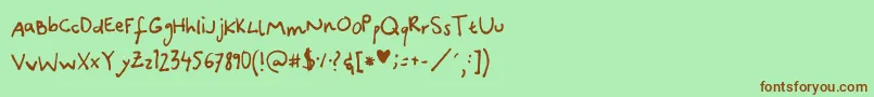 CanidaeHand Font – Brown Fonts on Green Background