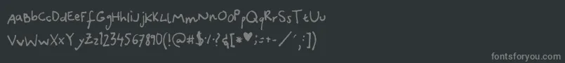 フォントCanidaeHand – 黒い背景に灰色の文字