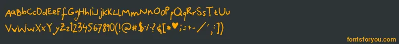 フォントCanidaeHand – 黒い背景にオレンジの文字