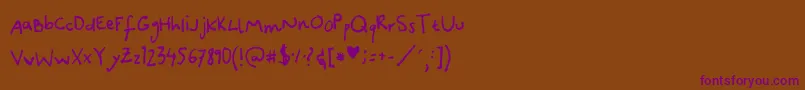 Czcionka CanidaeHand – fioletowe czcionki na brązowym tle