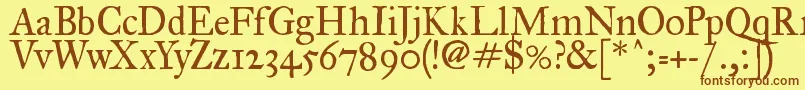 フォントFegprm2 – 茶色の文字が黄色の背景にあります。