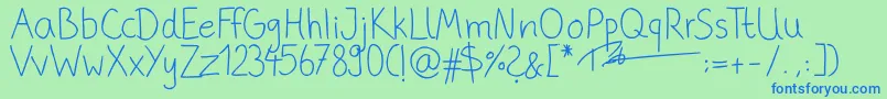 PhitradesignHandwrittenThin-Schriftart – Blaue Schriften auf grünem Hintergrund