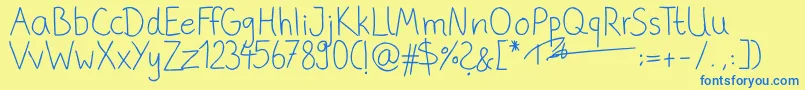 PhitradesignHandwrittenThin Font – Blue Fonts on Yellow Background