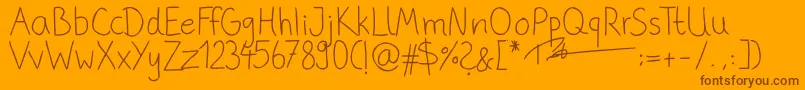 fuente PhitradesignHandwrittenThin – Fuentes Marrones Sobre Fondo Naranja
