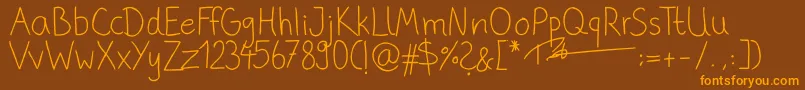 fuente PhitradesignHandwrittenThin – Fuentes Naranjas Sobre Fondo Marrón
